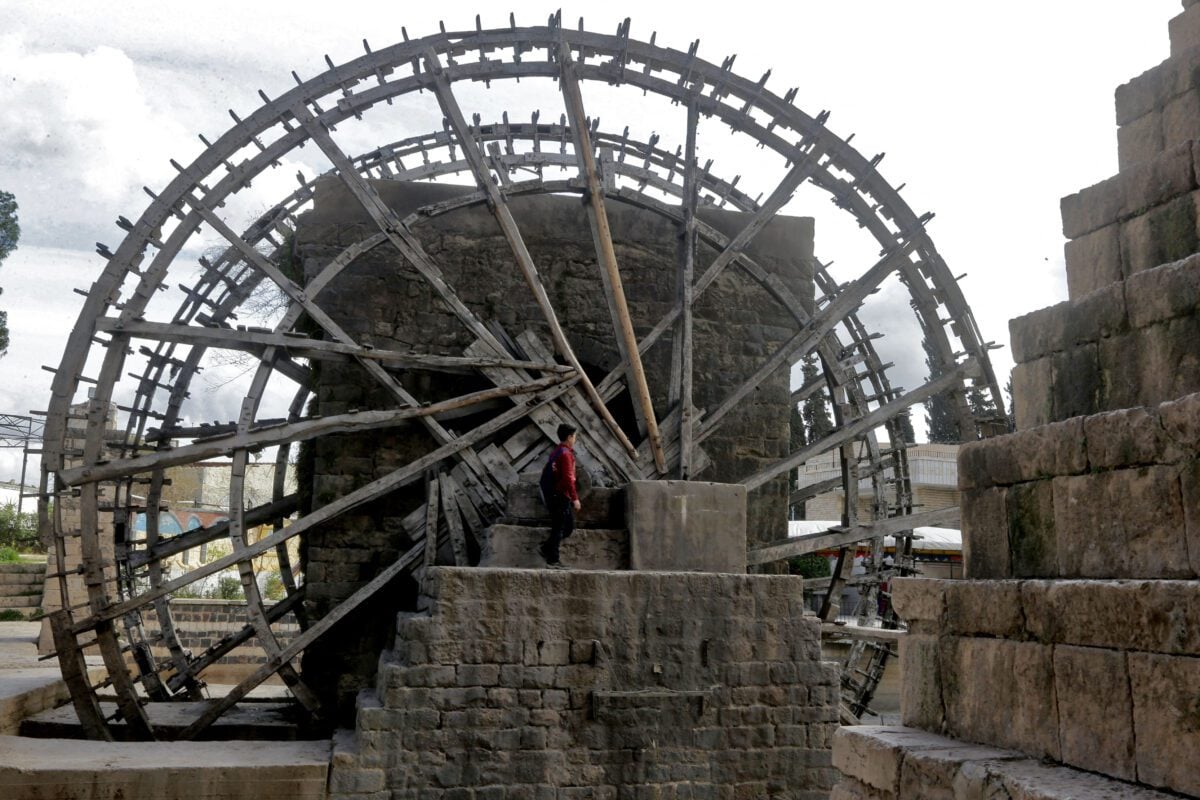 a traditional water-raising machine for irrigation on the Orontes River in the Syrian central city of Hama.